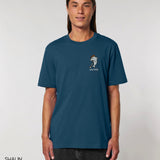 Person wearing Golphin Dark embroidered golf t-shirt casual style in deep teal